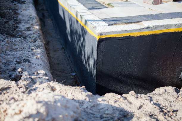 Professional Waterproofing technician working in Irwin, PA